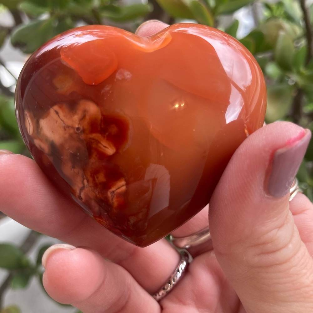 Stunning polished carnelian heart palmstone